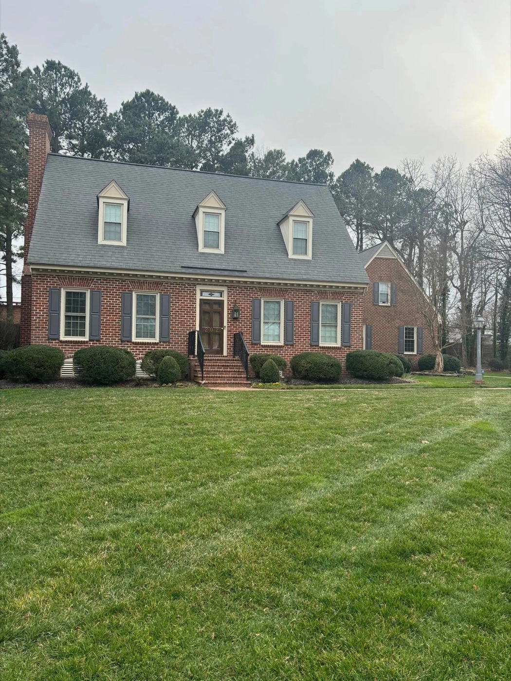 Finished cape cod home exterior